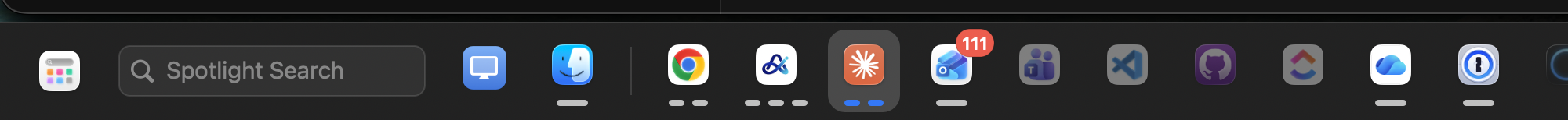 The Spaces Bar taskbar along the bottom of a Mac screen, showing app icons with running indicators and a notification badge.